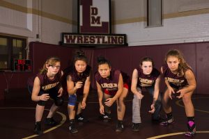 Five female high school wrestlers