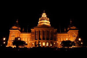 The Iowa State Capitol lit up at night.