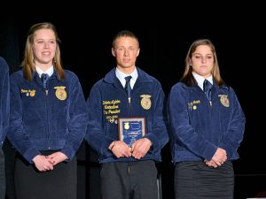 Dakota Lyddon of Hoover (center) took second place in the state for his Agricultural Sales demonstration.