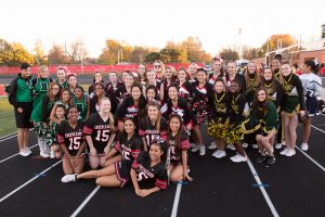 Cheerleaders representing all five DMPS high schools were part of the community-wide support shown for East High seniors.