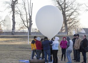 Science Bound students at Callanan Middle School prepare to launch a weather balloon.
