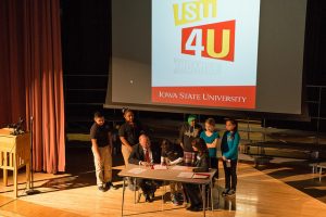 Students joins ISU and DMPS officials in launching the ISU 4U Promise program.