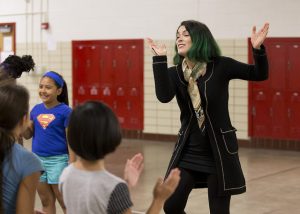 Cristina Pato of the Silk Road Project leads students at Madison Elementary School in a music and dance lesson.