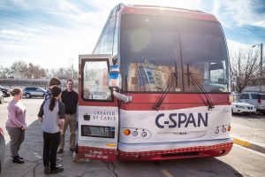 Students at Roosevelt High School visit C-SPAN's "Road to the White House" tour bus.