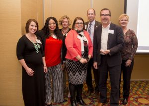 DMPS Director of Communications Phil Roeder (second from right) with members of the ISPRA Board of Directors at their annual awards banquet.