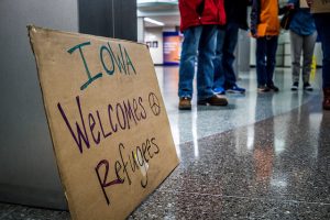 Sign that reads Iowa welcomes refugees