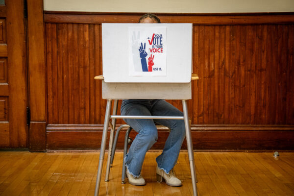 Student in voting booth