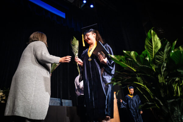 Student receiving their high school diploma