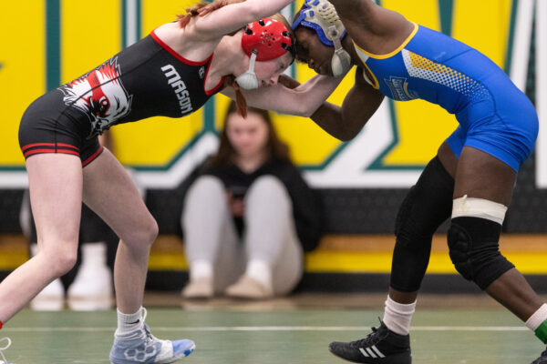 two girls wrestling in a match